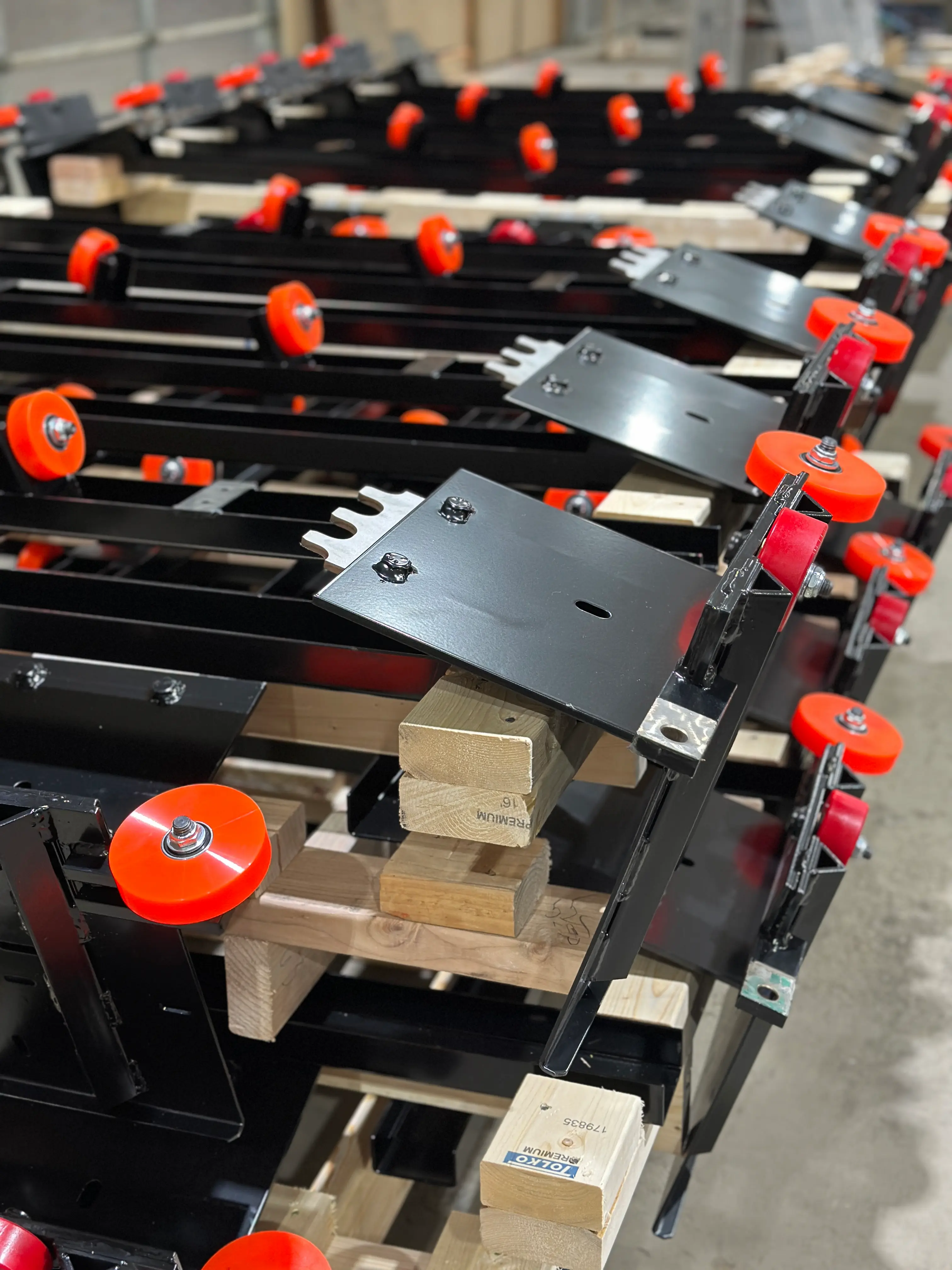 Stacked laser cut and welded conveyor system assemblies